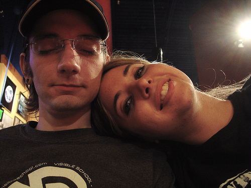 Elisabeth leaning her head on Will's shoulder